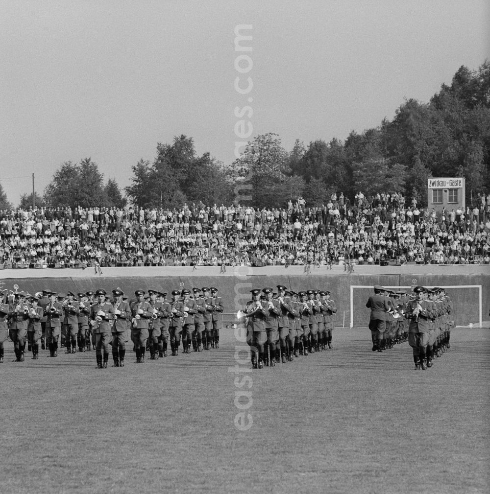 GDR image archive: Chemnitz - NVA military band playing in a stadium before an audience in Chemnitz in Saxony today