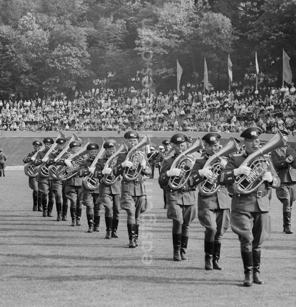 GDR photo archive: Chemnitz - NVA military band playing in a stadium before an audience in Chemnitz in Saxony today