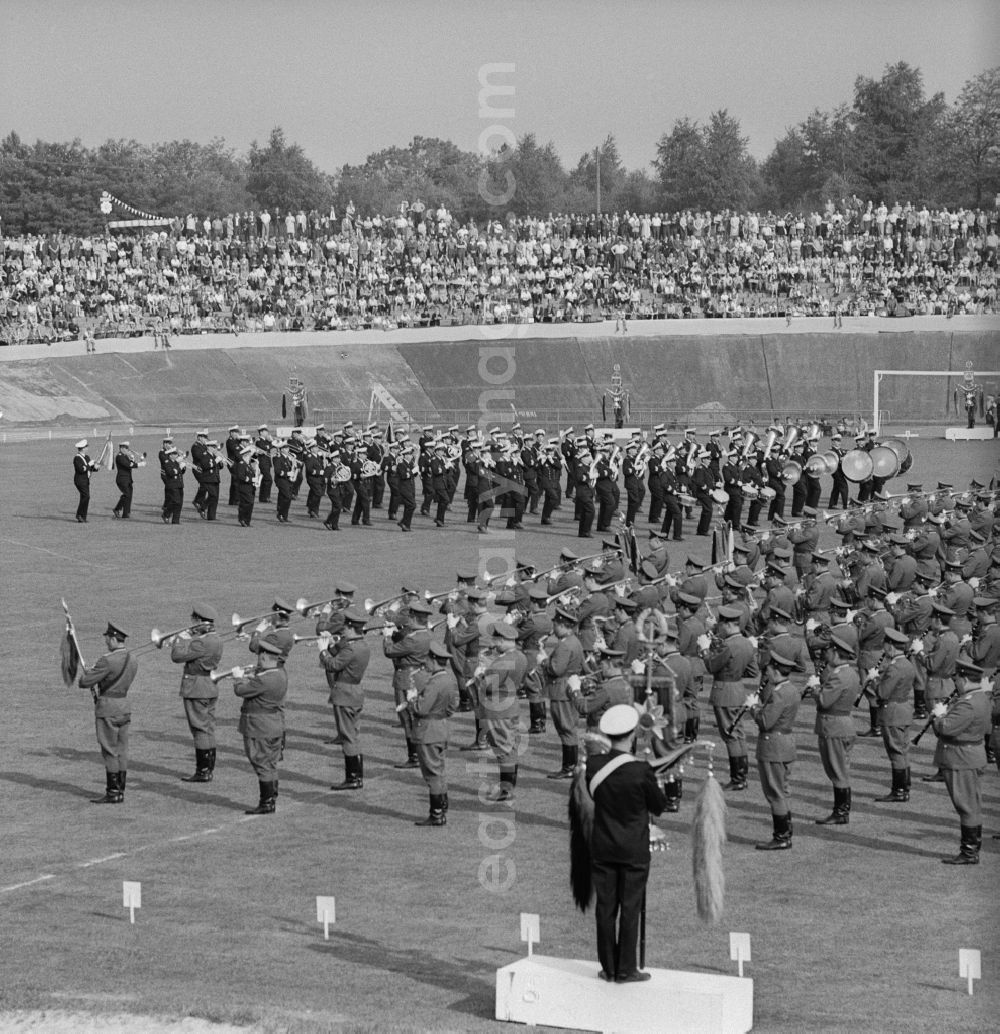 Chemnitz: NVA military band playing in a stadium before an audience in Chemnitz in Saxony today