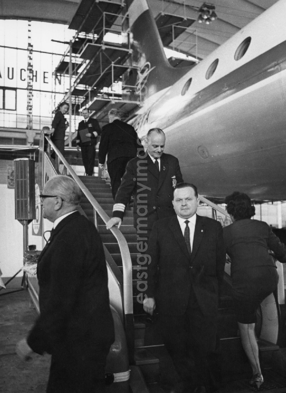 Schönefeld: Colonel Paul Wilpert, the then Minister for Transport Erwin Kramer and the Principal Director Arthur Pieck (left) in a hangar INTERFLUG Schoenefeld in today's Brandenburg