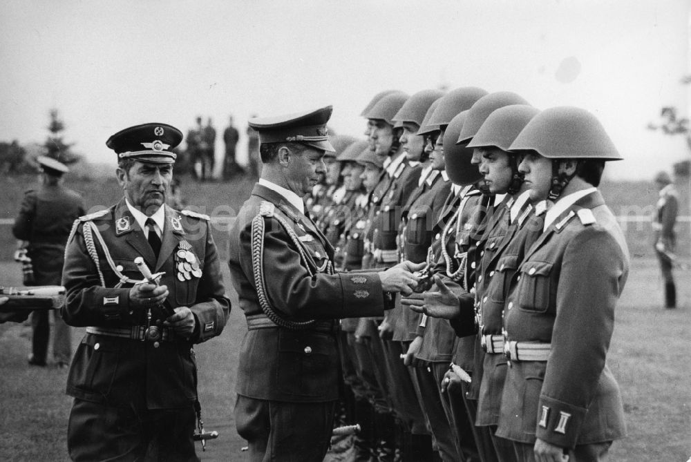 GDR picture archive: Cottbus - Swearing-in fighter wings 1 in Cottbus in Brandenburg by Colonel General Wolfgang Reinhold (1923 - 2