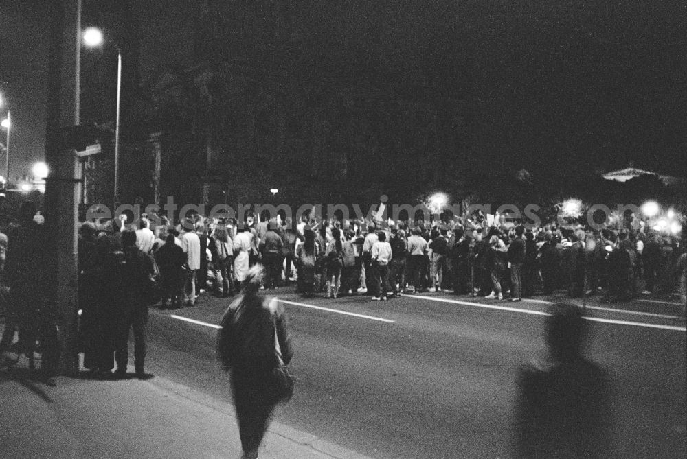 GDR image archive: Berlin - Trucks and soldiers of the NVA blocking the road across the street prevent the further march of an unregistered and unauthorized demonstration and street protest action on the street Unter den Linden in the Mitte district of Berlin East Berlin on the territory of the former GDR, German Democratic Republic