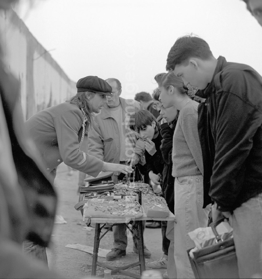Berlin: Ostalgie- souvenir sellers at the Berlin Wall in Berlin
