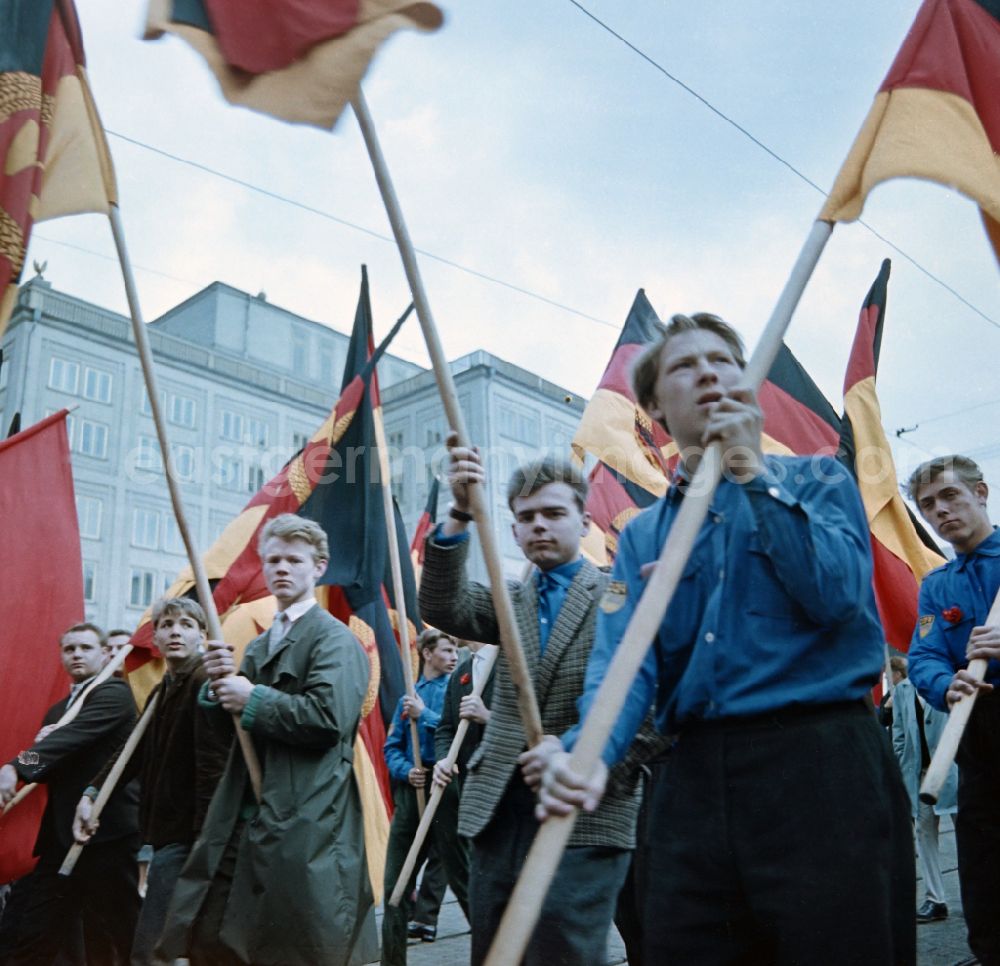 Leipzig: Parade with flags during the celebrations of the 1st of May 1964 in the district Mitte in Leipzig in the state Saxony on the territory of the former GDR, German Democratic Republic