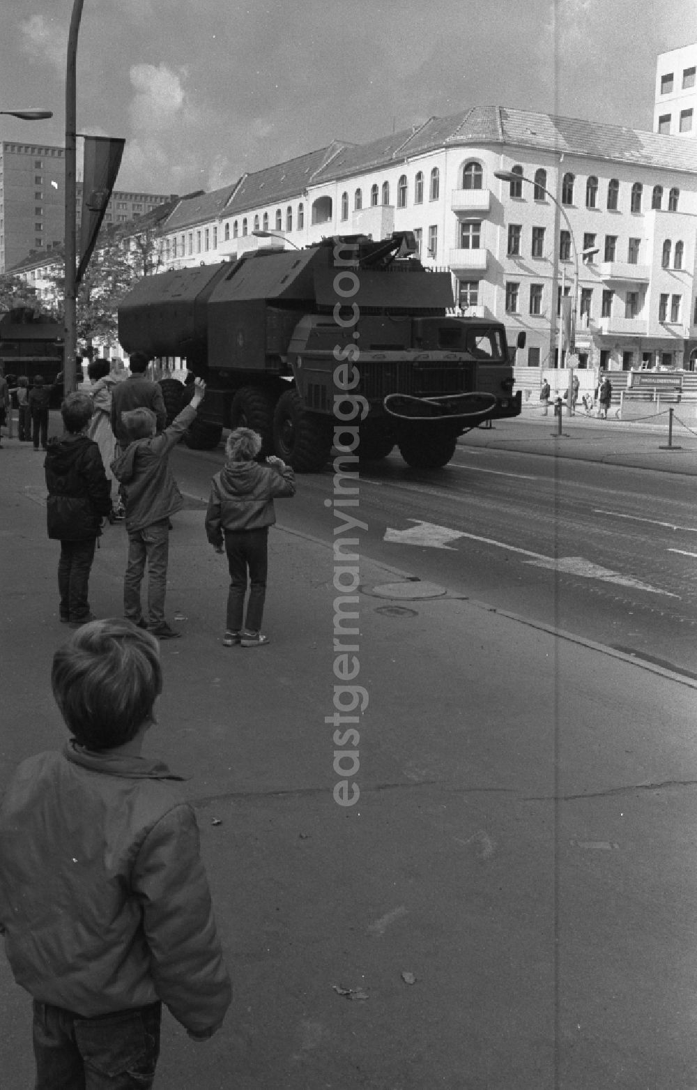 GDR photo archive: Berlin - Parade ride of military and combat technology of the FLA rocket troops of the NVA National People's Army for the national holiday on Karl-Marx-Allee in the district of Friedrichshain in Berlin East Berlin on the territory of the former GDR, German Democratic Republic