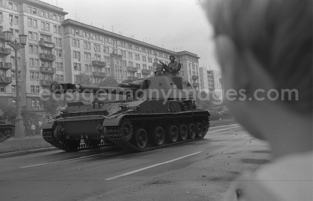 GDR picture archive: Berlin - Parade ride of military and combat technology of the tank troops of the NVA National People's Army for the national holiday on Karl-Marx-Allee in the district of Friedrichshain in Berlin East Berlin on the territory of the former GDR, German Democratic Republic