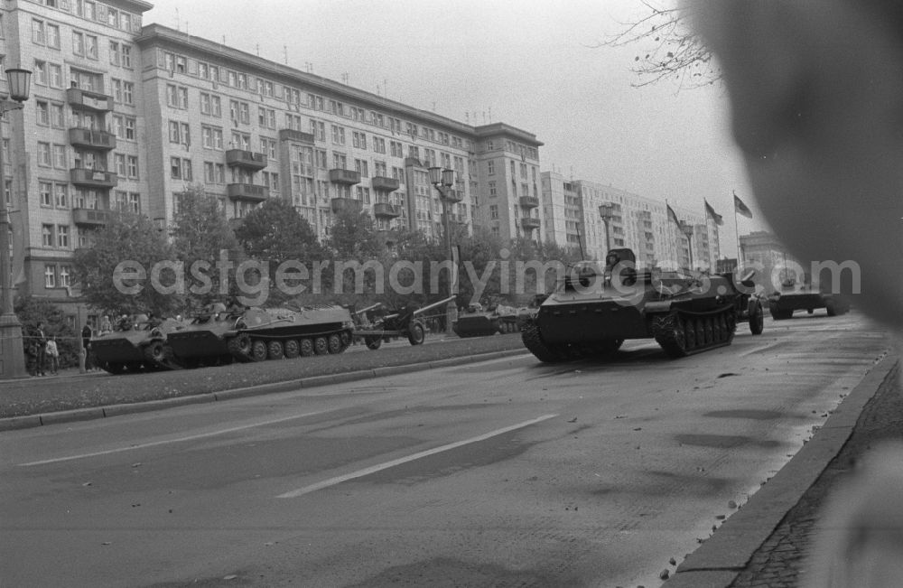 GDR photo archive: Berlin - Parade ride of military and combat technology of the tank troops of the NVA National People's Army for the national holiday on Karl-Marx-Allee in the district of Friedrichshain in Berlin East Berlin on the territory of the former GDR, German Democratic Republic