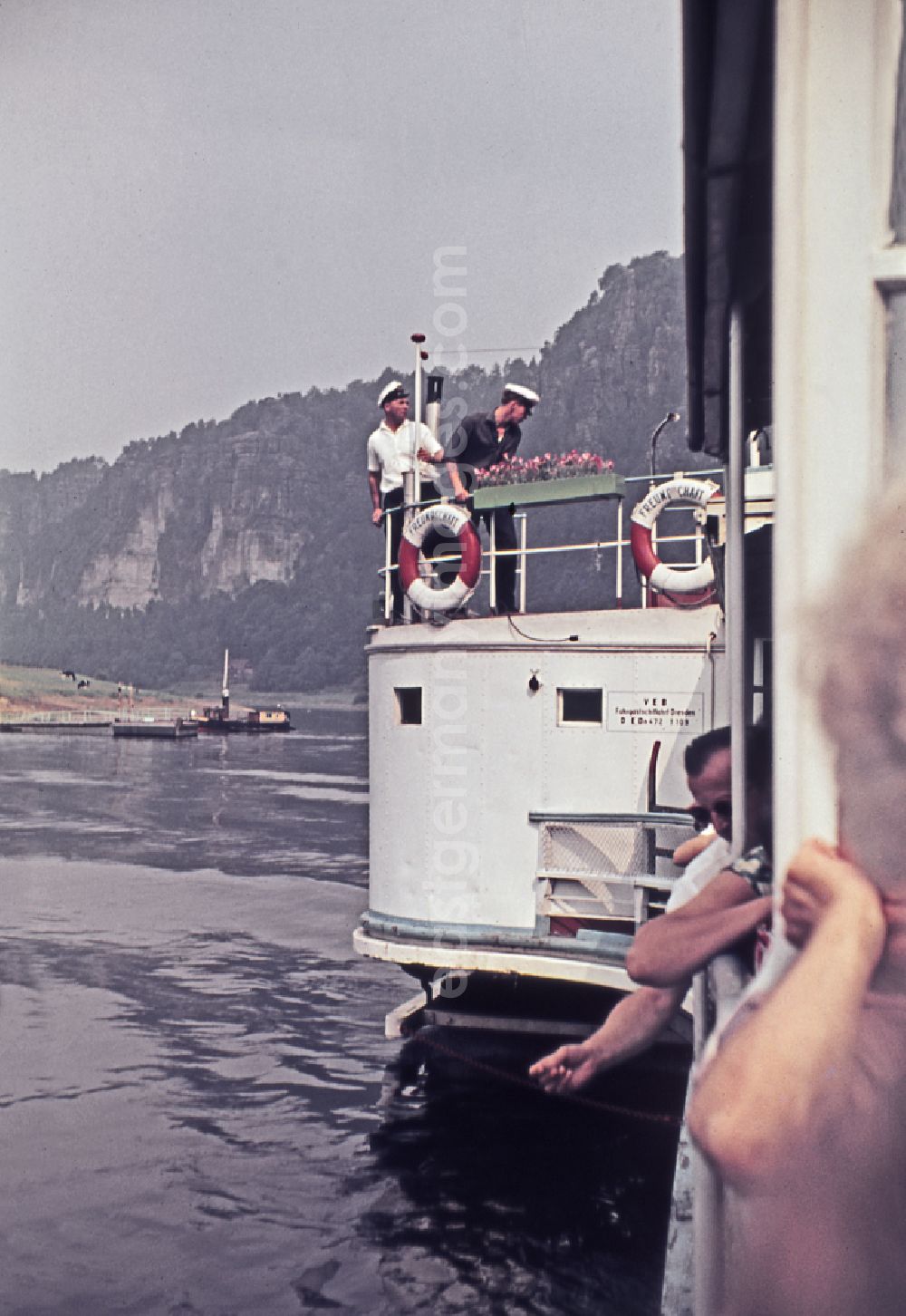 GDR photo archive: Bad Schandau - Passenger ship for passenger transport - paddle steamer sailing on the Elbe in Bad Schandau, Saxony in the territory of the former GDR, German Democratic Republic