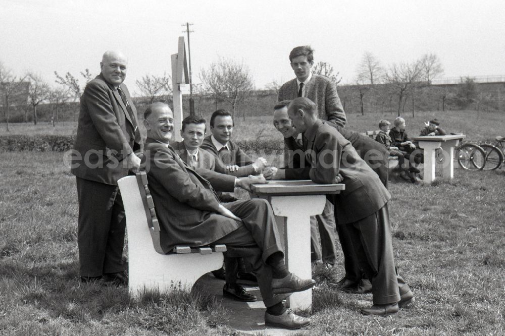 GDR image archive: Gotha - Men sitting together during a break at a motorway service area near Gotha in the state Thuringia on the territory of the former GDR, German Democratic Republic