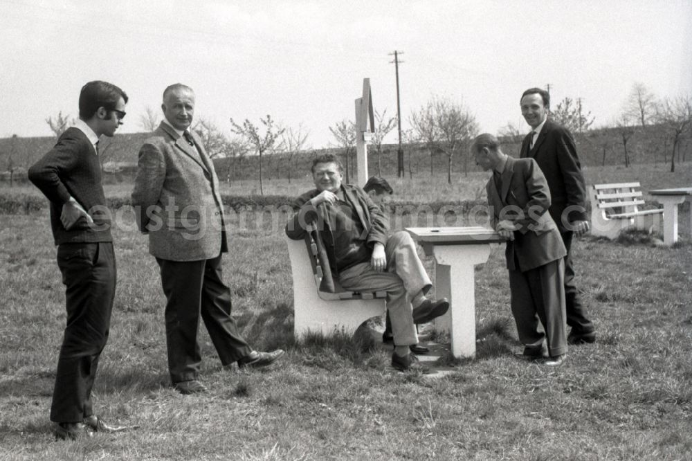 Gotha: Men sitting together during a break at a motorway service area near Gotha in the state Thuringia on the territory of the former GDR, German Democratic Republic