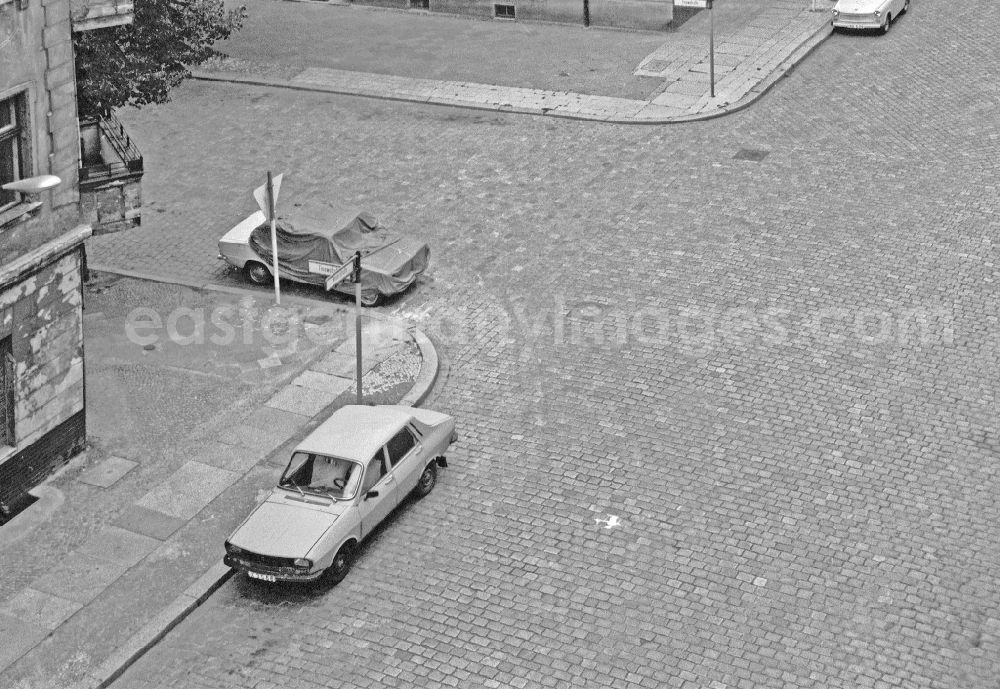 Berlin: Passenger Cars - Motor Vehicles in Road Traffic Dacia on street Weserstrasse in the district Friedrichshain in Berlin Eastberlin on the territory of the former GDR, German Democratic Republic