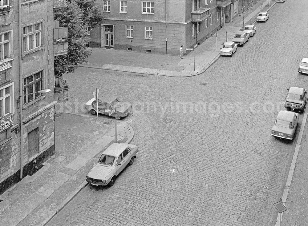 GDR image archive: Berlin - Passenger Cars - Motor Vehicles in Road Traffic Dacia on street Weserstrasse in the district Friedrichshain in Berlin Eastberlin on the territory of the former GDR, German Democratic Republic