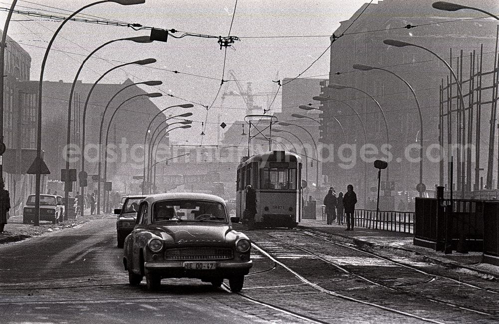 Berlin: Car - motor vehicle on the road Wartburg 311 in Friedrichstrasse in front of a tram in the district of Mitte in Berlin East Berlin on the territory of the former GDR, German Democratic Republic