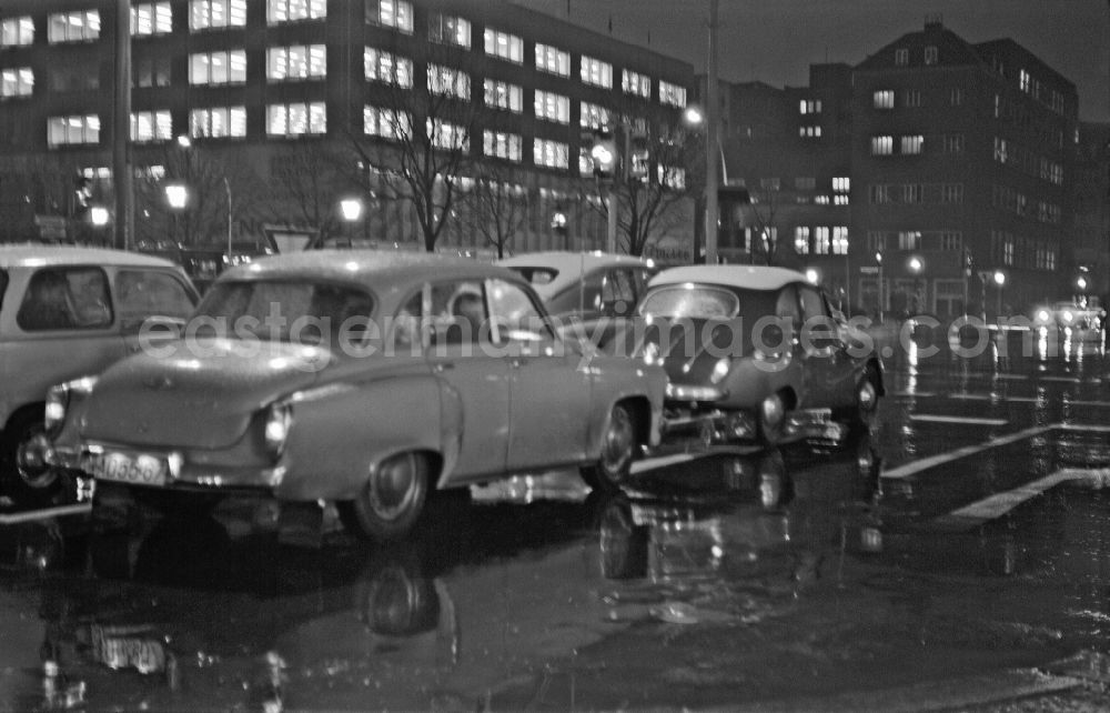 GDR photo archive: Berlin - Car - motor vehicle in traffic Wartburg 311 at night on Friedrichstrasse in Berlin East Berlin on the territory of the former GDR, German Democratic Republic