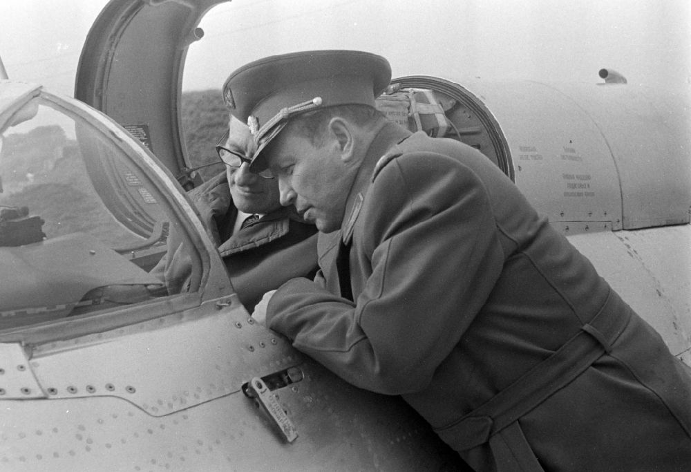 GDR image archive: Ribnitz-Damgarten - Portrait of Kurt Thieme (General Secretary of the Central Board of the Society for German-Soviet Friendship DSF) on the occasion of a visit to troops in a cockpit of a Mikoyan-Gurevich MiG-21 fighter aircraft of the GSSD Group of the Soviet Armed Forces in Germany in Ribnitz-Damgarten, Mecklenburg-Western Pomerania in the area the former GDR, German Democratic Republic