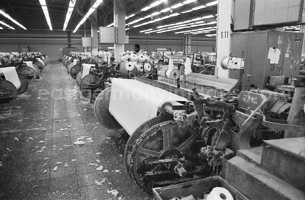 GDR picture archive: Ebersbach - Men at work and factory equipment in the workshop with loom machines in the VEB Lautex spinning mill in Ebersbach in GDR