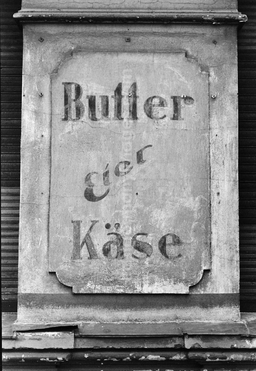 GDR image archive: Berlin - Promotional sign for butter, eggs and cheese of a consumption in Berlin, the former capital of the GDR, German democratic republic