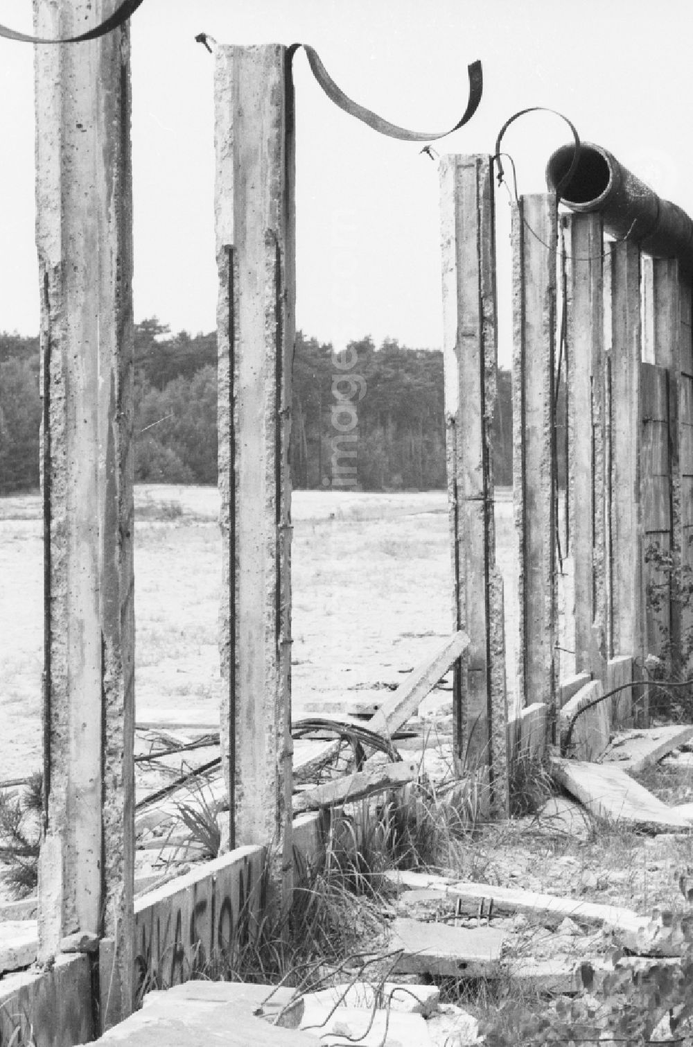 GDR picture archive: Potsdam - Residues already dismantled concrete segments at the Berlin Wall on the outskirts of Potsdam in Brandenburg