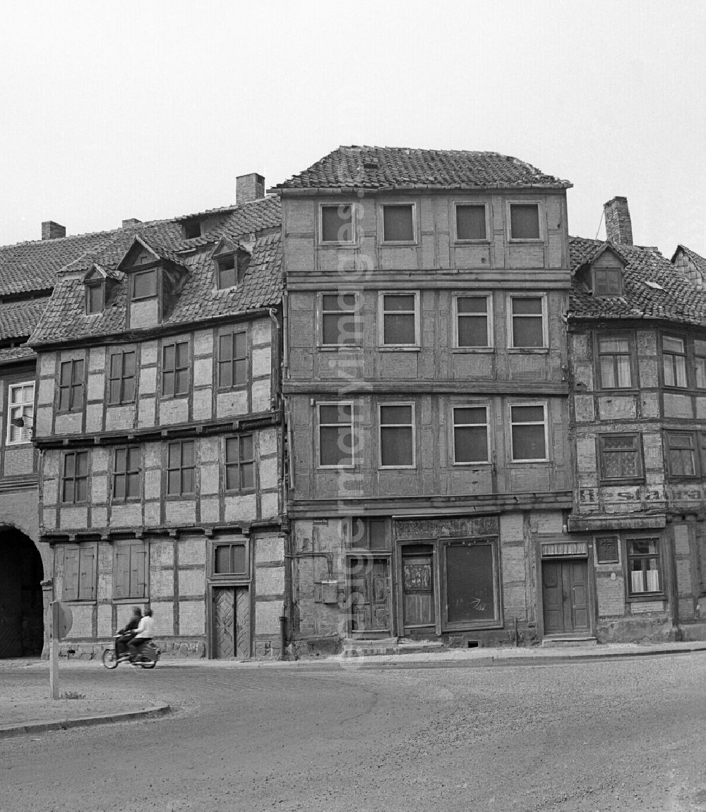 GDR picture archive: Halberstadt - Rubble and ruins Rest of the facade and roof structure of the half-timbered house Bei den Spritzen in Halberstadt in the state Saxony-Anhalt on the territory of the former GDR, German Democratic Republic