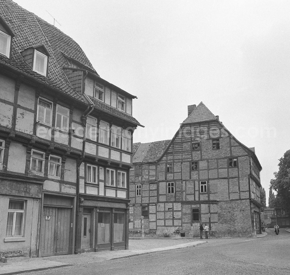 GDR image archive: Halberstadt - Rubble and ruins Rest of the facade and roof structure of the half-timbered house on Bakenstrasse - Judengasse in Halberstadt in the state Saxony-Anhalt on the territory of the former GDR, German Democratic Republic