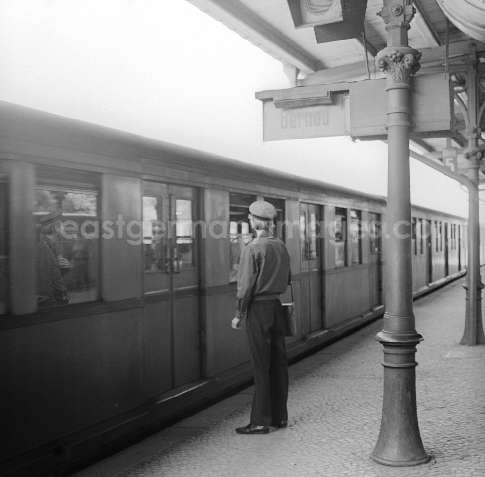 GDR image archive: Berlin - A conductor at the arrival/departure of an S-Bahn at Schoeneweide station in Berlin, the former capital of the GDR, German Democratic Republic