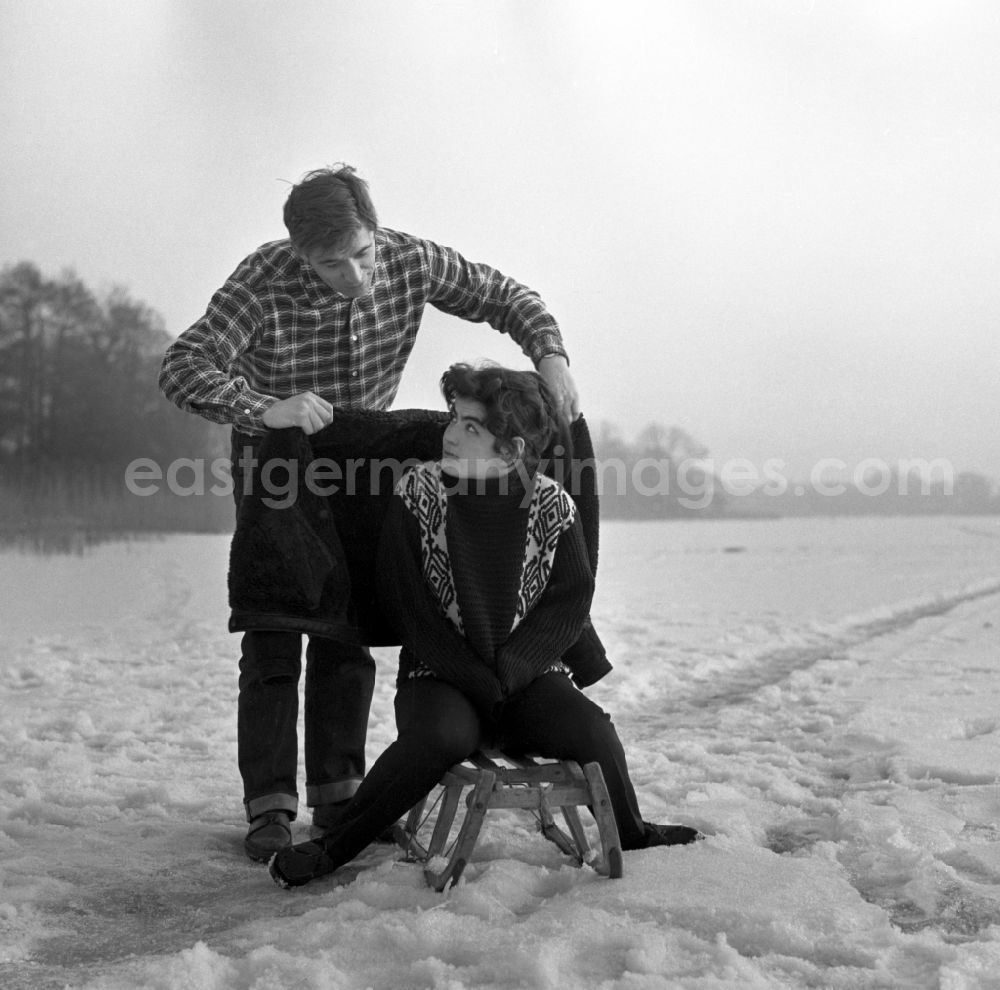 Berlin: The actress Kati Szekely (Catherine Székely) and the actor Juergen Frohriep on the snow-covered ice layer of the Mueggelsee in winter in Berlin, the former capital of the GDR, German Democratic Republic