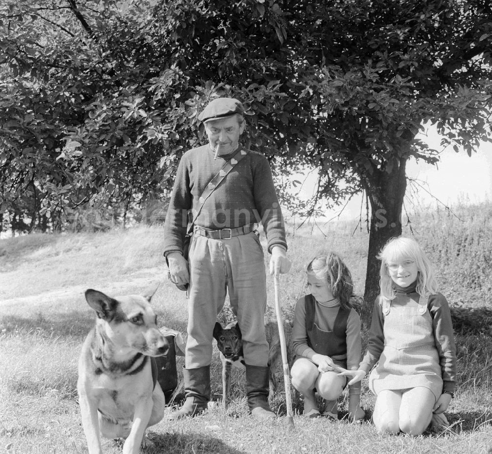 GDR photo archive: Lenzen (Elbe) - Shepherd with his two grandchildren in Lenzen(Elbe) in the federal state Brandenburg in the area of the former GDR, German democratic republic