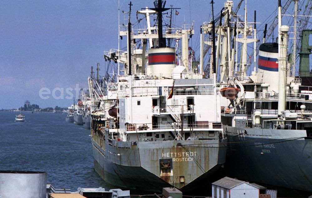 GDR picture archive: Rostock - Loading, supply and unloading of ships VEB Deutfracht - Seereederei Rostock DSR at the quays in the port area in Rostock in the state Mecklenburg-Western Pomerania on the territory of the former GDR, German Democratic Republic