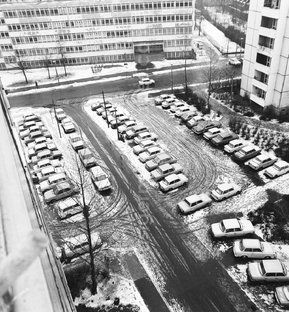 Berlin: Snow-covered cars on a parking lot in a residential area in Berlin, the former capital of the GDR, German Democratic Republic