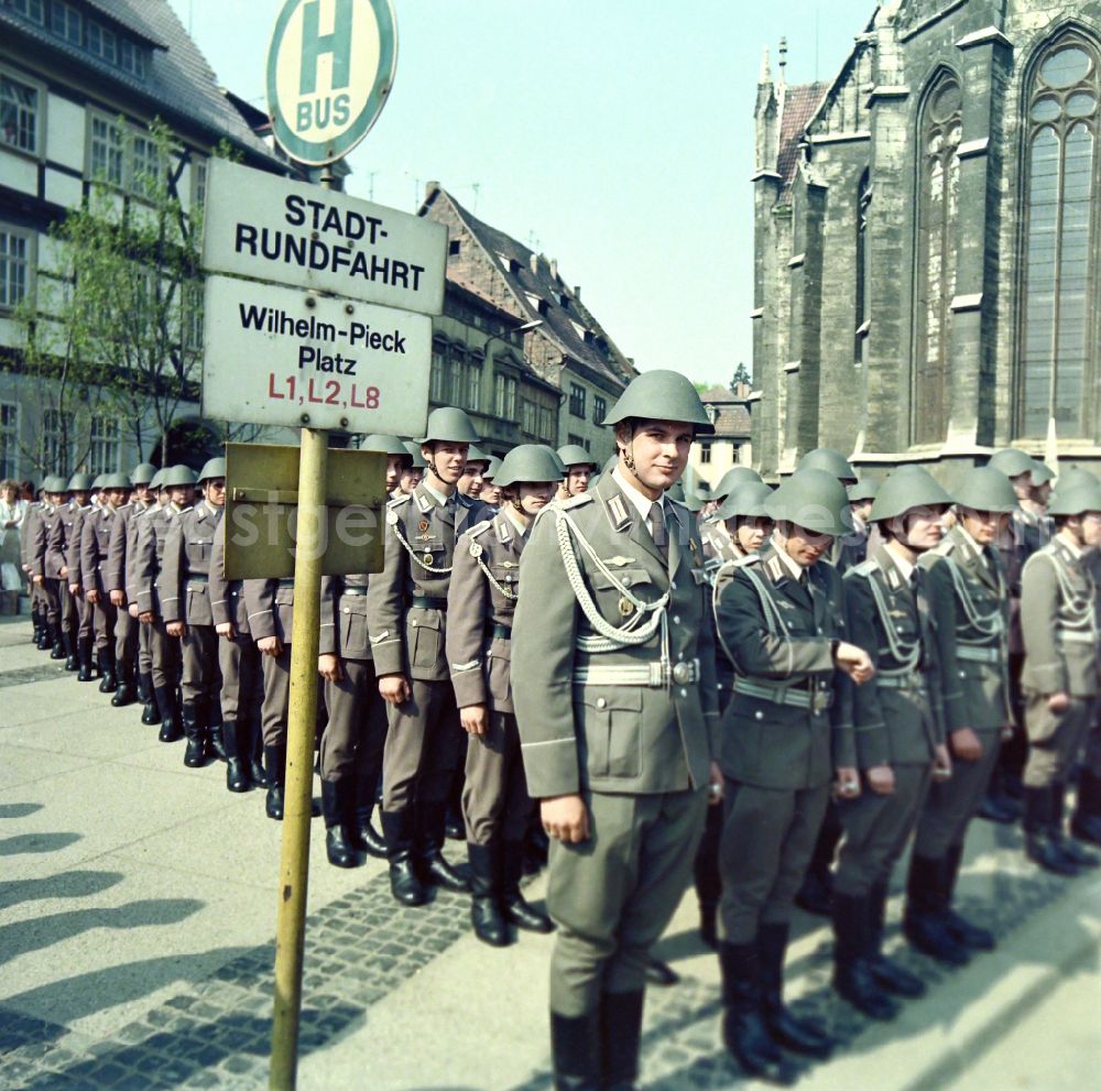 GDR image archive: Mühlhausen - Formation of soldiers and officers on the occasion of the ceremony to take the oath of allegiance to the NVA National People's Army on Wilhelm-Pieck-Platz in Muehlhausen in the state of Thuringia on the territory of the former GDR, German Democratic Republic