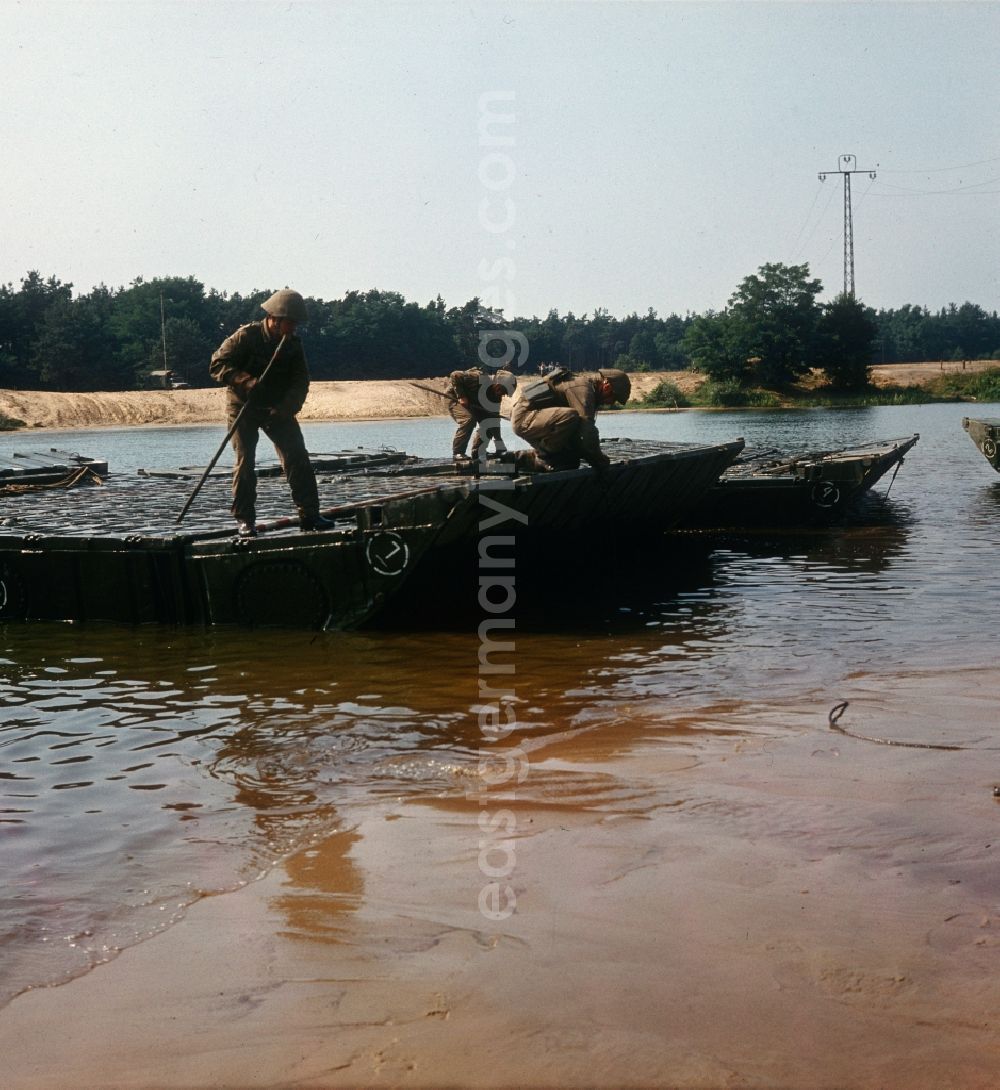 GDR image archive: Lieberose - NVA soldiers at the pontoon bridge in Brandenburg