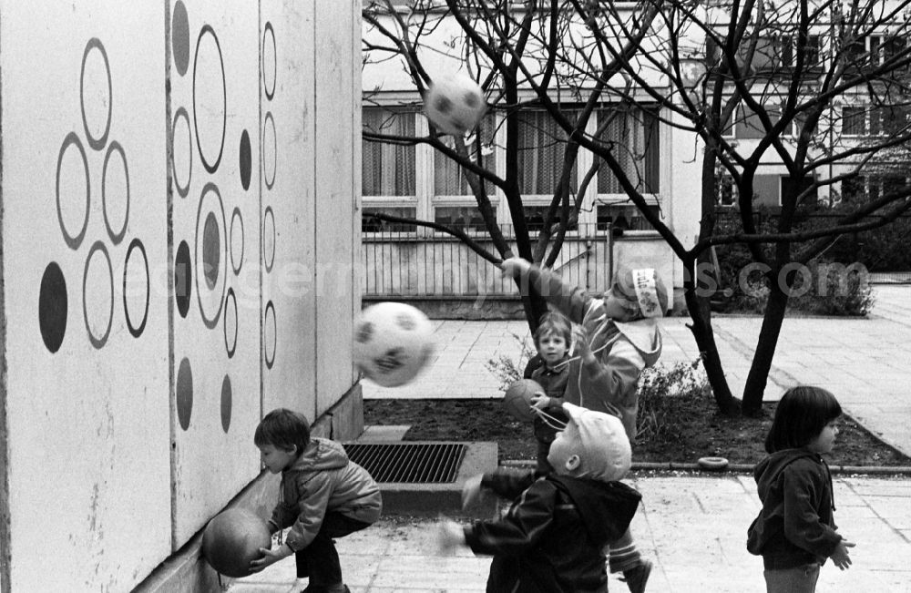 GDR photo archive: Berlin - Children and young people in a playground in the district Mitte in Berlin Eastberlin, the former capital of the GDR, German Democratic Republic
