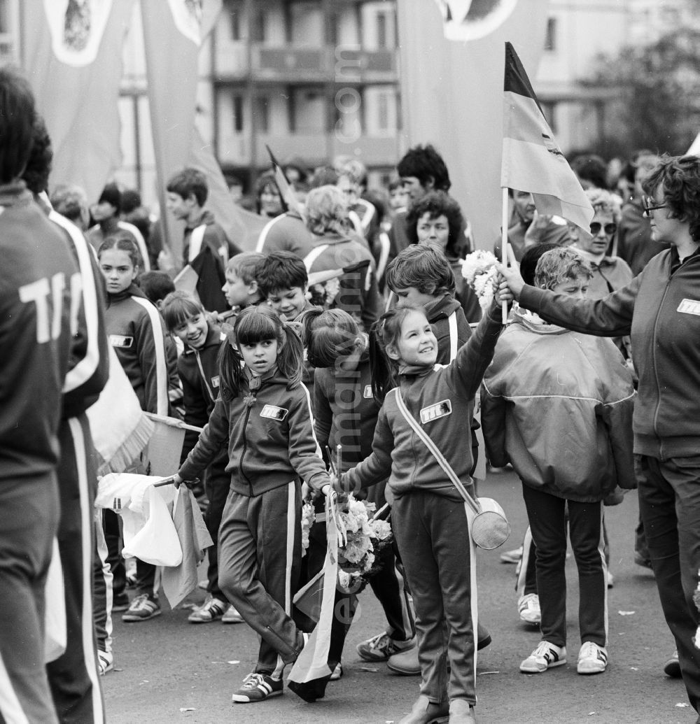 GDR image archive: Berlin - Athletes of the sports club TSC (Berliner Turn- und Sportclub)Berlin will meet with flags and other winged elements for the 1st May Demonstration in Berlin, the former capital of the GDR, German Democratic Republic