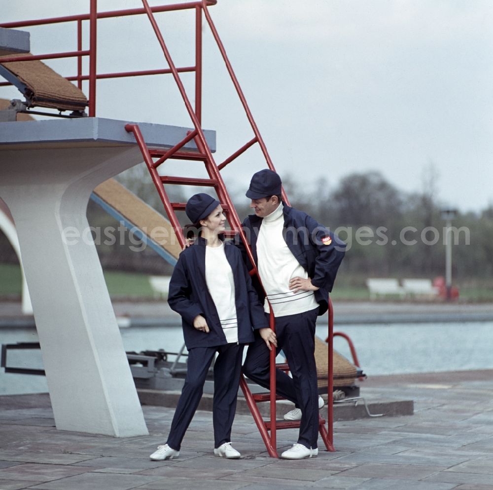 GDR picture archive: Berlin - Presentation of current sports fashion - collection the Olympic team in the outdoor pool in the district Pankow in Berlin, the former capital of the GDR, German Democratic Republic