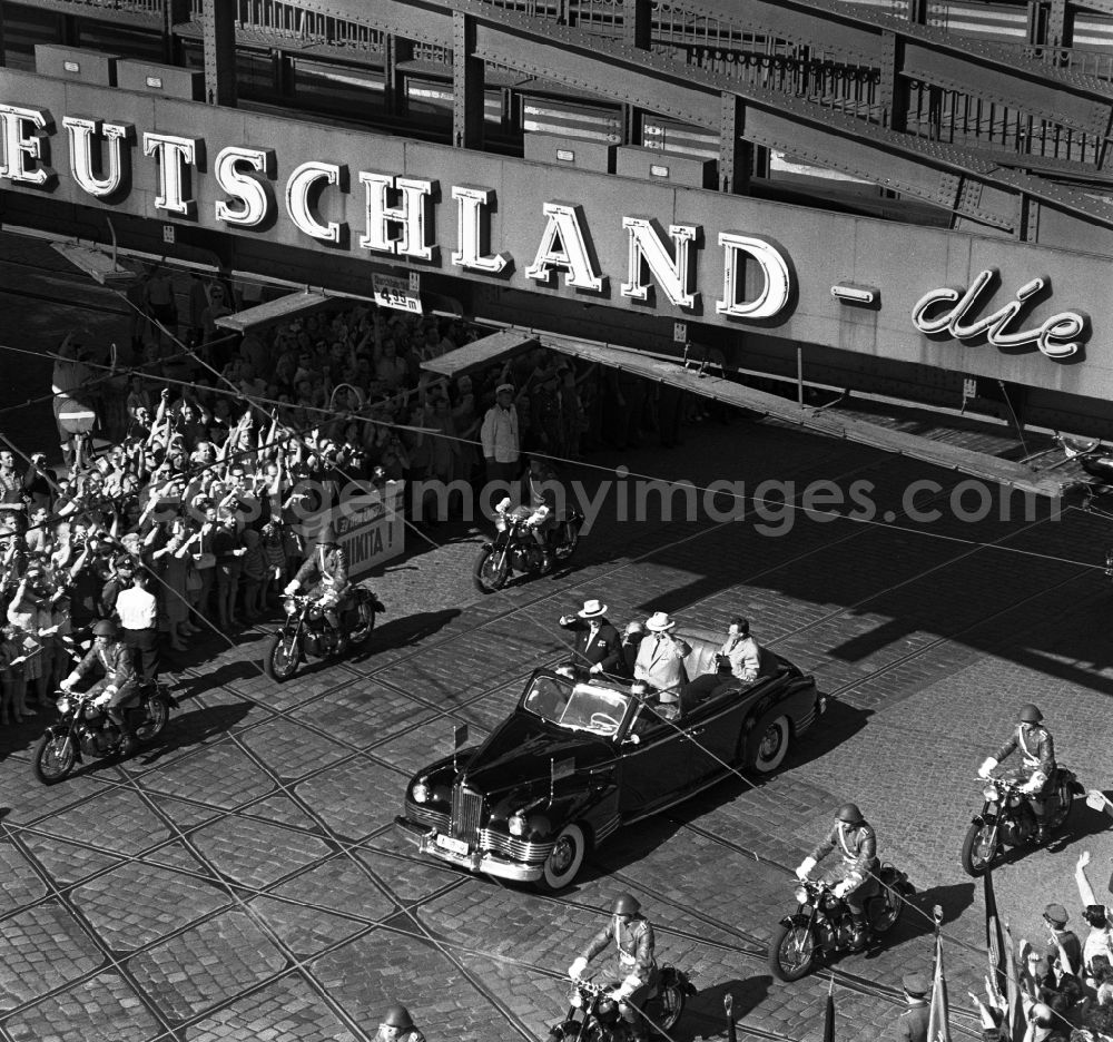 Berlin: State visit of the Soviet Prime Minister Nikita Khrushchev to Berlin in the territory of the former GDR, German Democratic Republic. Nikita Khrushchev and Walter Ulbricht drive past spectators together at Alexanderplatz