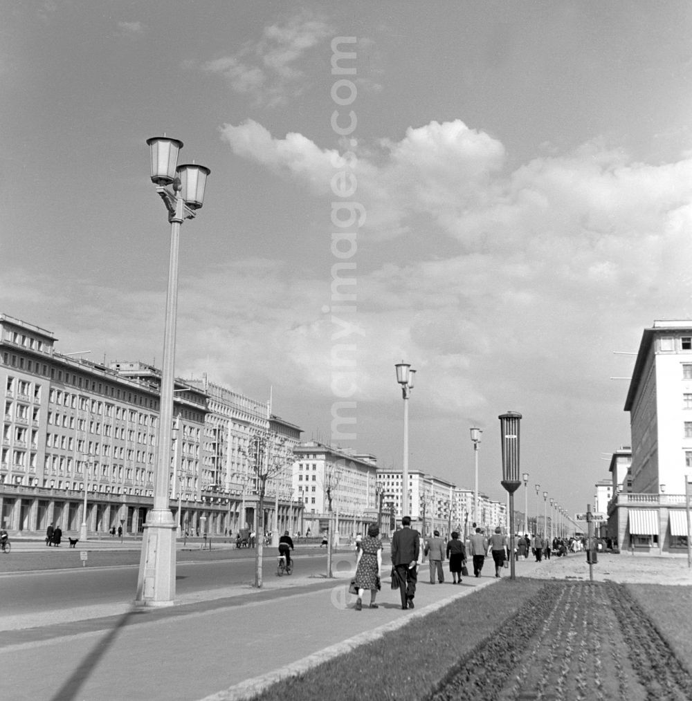 GDR picture archive: Berlin - People strolling in the newly built Stalinallee (now Karl-Marx-Allee) in East Berlin in the district of Friedrichshain on the territory of the former GDR, German Democratic Republic