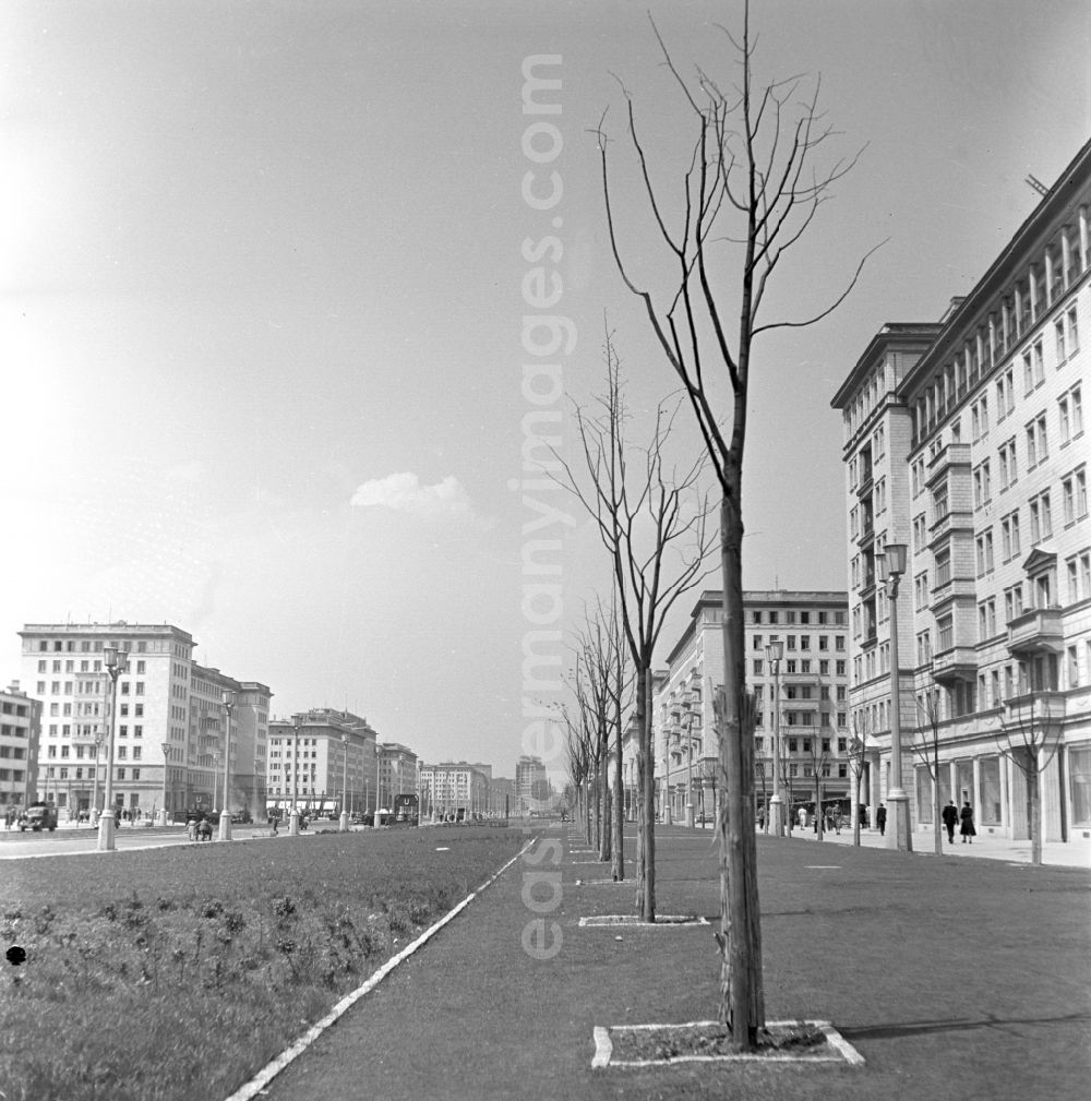 GDR image archive: Berlin - People strolling in the newly built Stalinallee (now Karl-Marx-Allee) in East Berlin in the district of Friedrichshain on the territory of the former GDR, German Democratic Republic