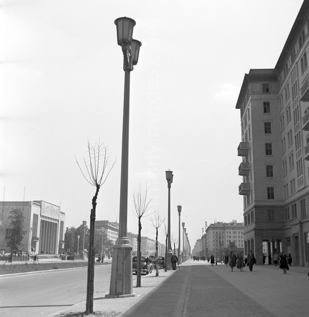 GDR image archive: Berlin - People strolling in the newly built Stalinallee (now Karl-Marx-Allee) in East Berlin in the district of Friedrichshain on the territory of the former GDR, German Democratic Republic