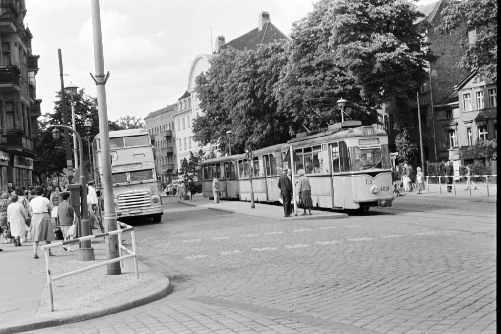 GDR image archive: Berlin - Tram train of the series Typ T 24 E and double-decker bus Do56 at Garbatyplatz - Berliner Strasse in the Pankow district in Berlin East Berlin on the territory of the former GDR, German Democratic Republic