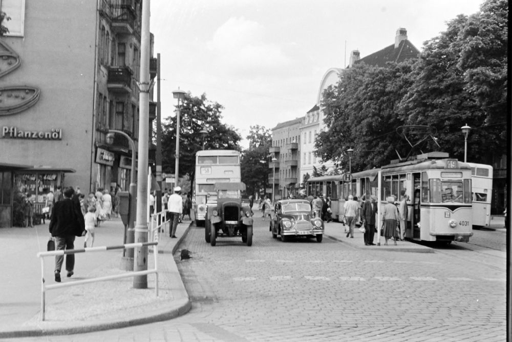 GDR photo archive: Berlin - Tram train of the series Typ T 24 E and double-decker bus Do56 at Garbatyplatz - Berliner Strasse in the Pankow district in Berlin East Berlin on the territory of the former GDR, German Democratic Republic