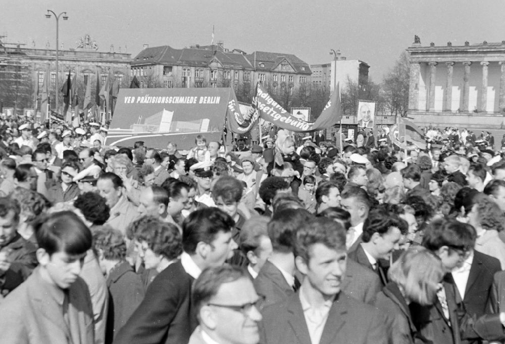 GDR image archive: Berlin - Participants der Demonstration zum 1. Mai on the streets of the city center on place Schlossplatz on place Schlossplatz ( Marx-Engels-Platz ) in Berlin Eastberlin on the territory of the former GDR, German Democratic Republic