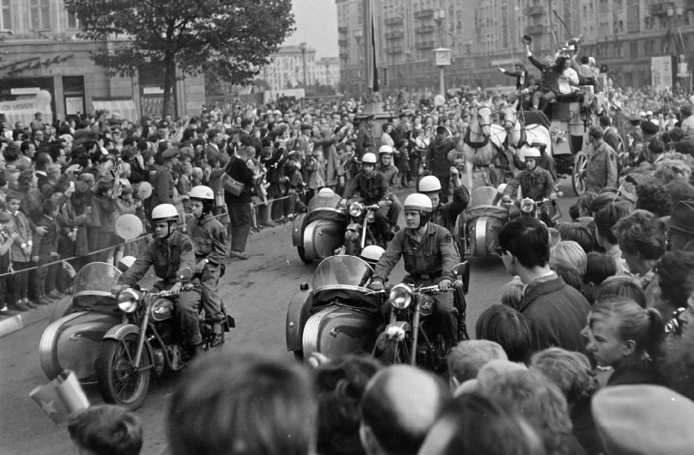 GDR image archive: Berlin - Motorcyclists with an EMW R35/3 sidecar as participants in the May 1st parade on the streets of the city center at Strausberger Platz in the Friedrichshain district of Berlin East Berlin in the area of ??the former GDR, German Democratic Republic