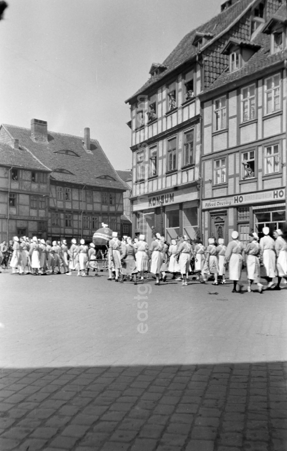 GDR image archive: Halberstadt - Nurses as march participants of the demonstration for the holiday of May 1st on the Johannesbrunnen on the streets of the city center in Halberstadt in the state of Saxony-Anhalt in the area of the former GDR, German Democratic Republic