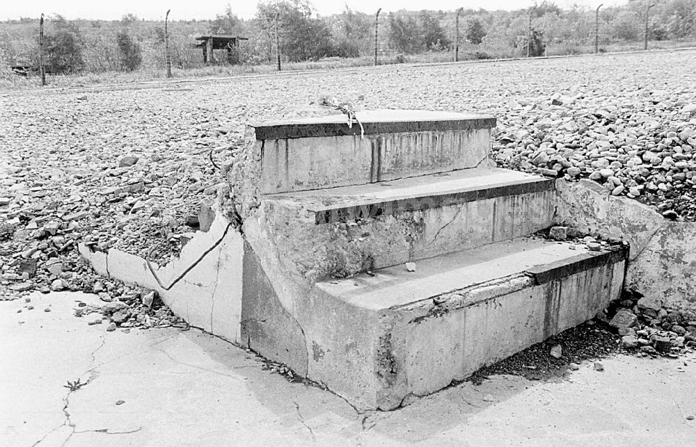 GDR picture archive: Buchenwald - Remains of stairs on the gravel area of a former camp barracks at the National Memorial and Site of the former KL concentration camp in Buchenwald in Thuringia on the territory of the former GDR, German Democratic Republic