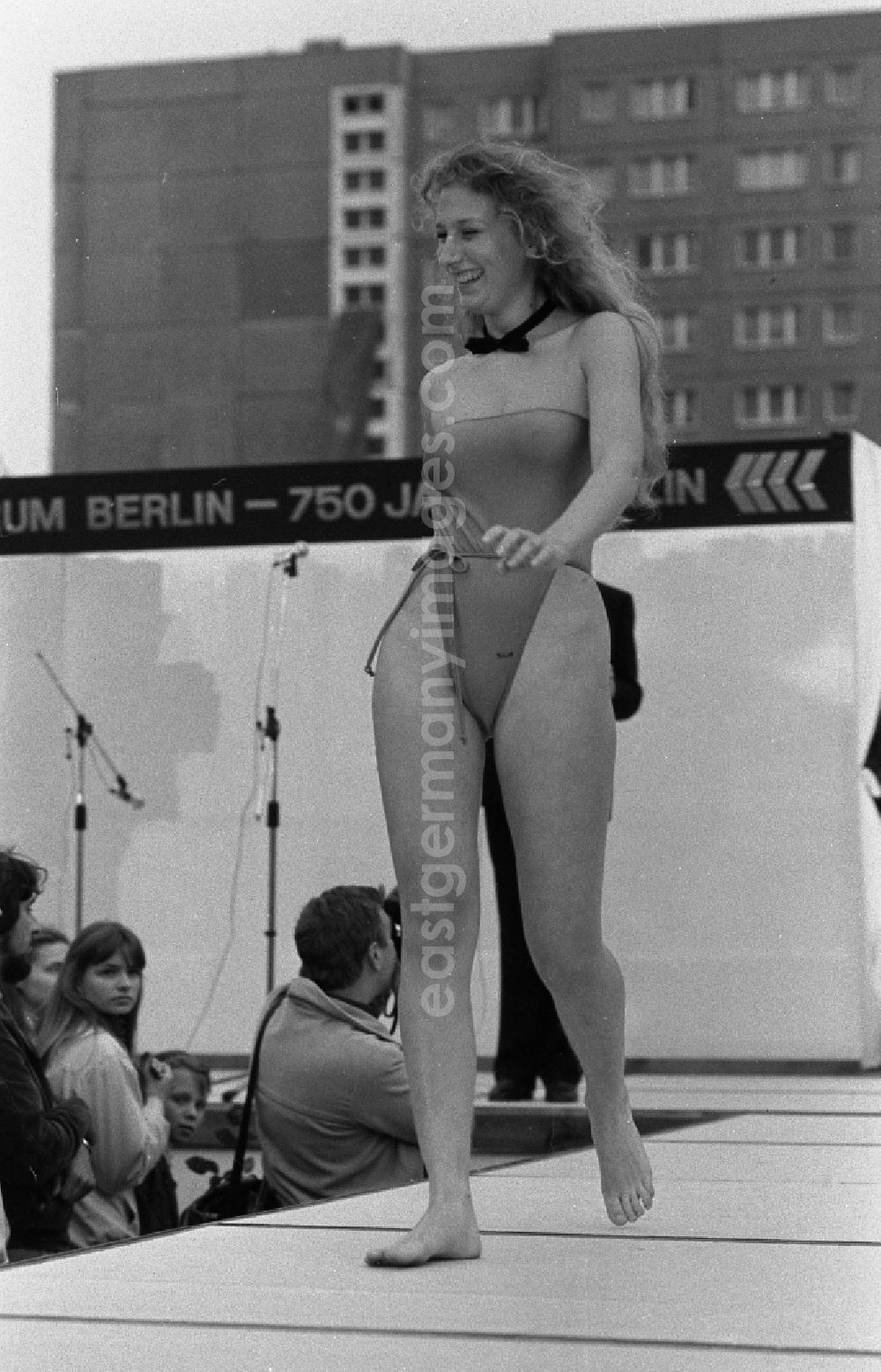 GDR photo archive: Berlin - Event and demonstration for the Wahl Miss Fruehling in the district of Marzahn in Berlin East Berlin on the territory of the former GDR, German Democratic Republic. Young girls and women present new swimwear and bikinis on the fashion catwalk