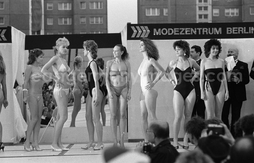 GDR picture archive: Berlin - Event and demonstration for the Wahl Miss Fruehling in the district of Marzahn in Berlin East Berlin on the territory of the former GDR, German Democratic Republic. Young girls and women present new swimwear and bikinis on the fashion catwalk
