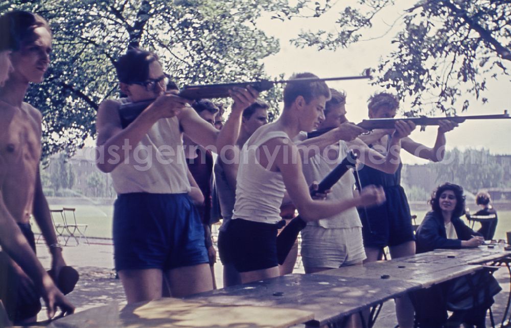 Berlin: Practical training with a pre-military character in preparation for military service in air rifle shooting on the sports field at Koepenicker Landstrasse 186 in Berlin East Berlin on the territory of the former GDR, German Democratic Republic