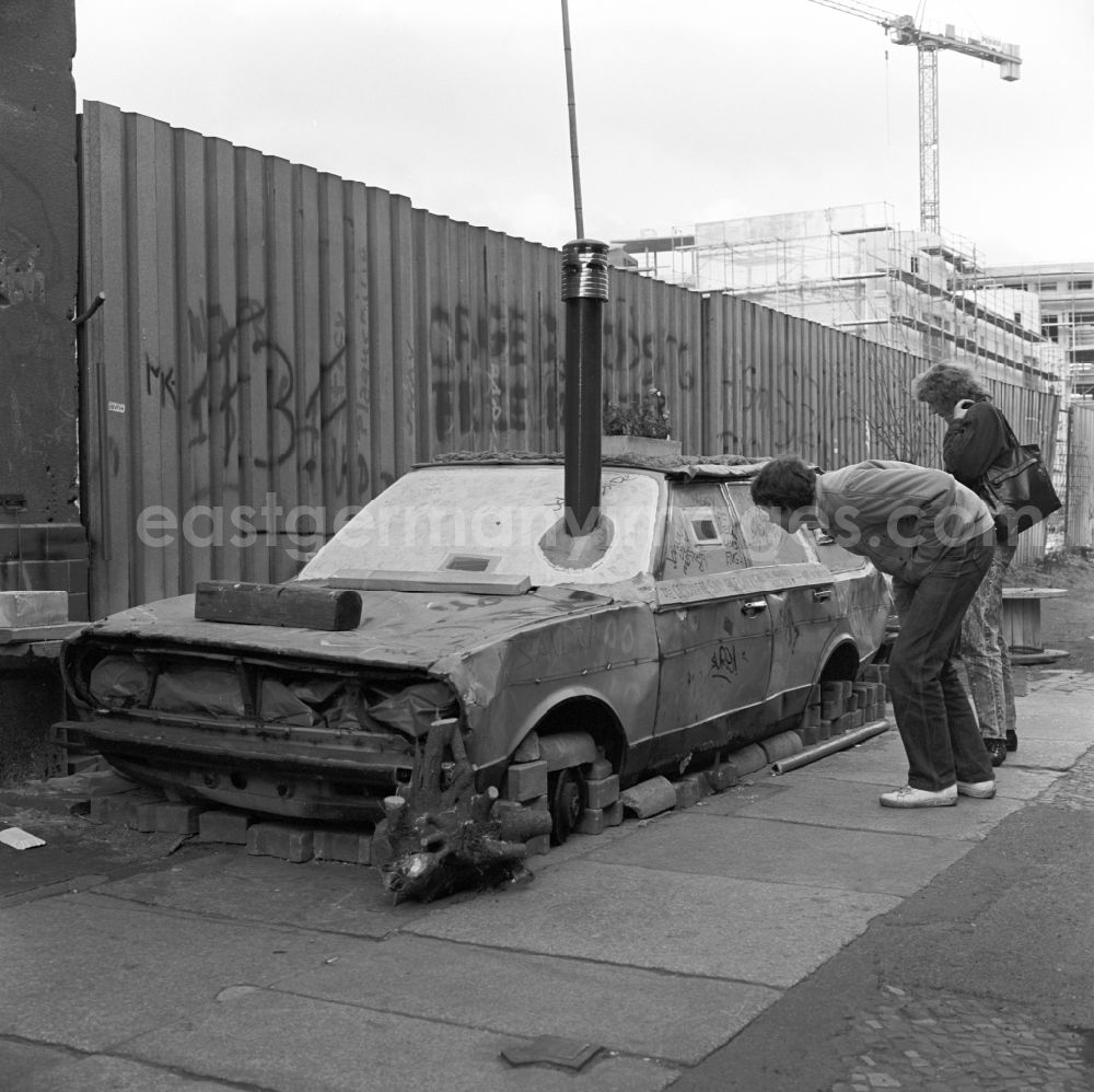Berlin - Mitte: Wagons along the Berlin Wall in Berlin - Mitte