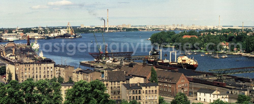 GDR picture archive: Rostock - View from the Haus der Schiffahrt over the riverside Warnowufer at the estuary Unterwarnow in the federal state of Mecklenburg-Western Pomerania in the territory of the former GDR, German Democratic Republic