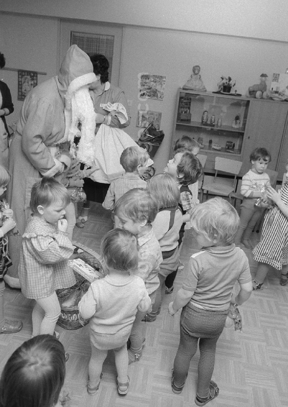 Berlin: The Santa Claus gives children with presents in a kindergarten in Berlin, the former capital of the GDR, German democratic republic
